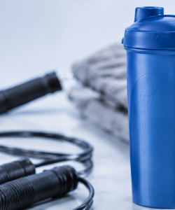 Premium fitness accessories including shaker bottle and training essentials