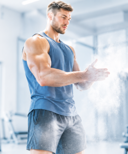 Athlete preparing for an intense workout in a modern gym with intra workout support
